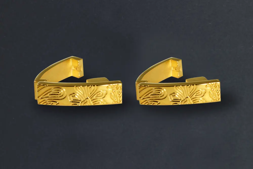 Gold plated, hinged cufflinks with engraved flower pattern