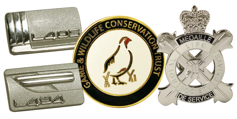Range of premium custom badges in gold and silver plate with enamel detailing