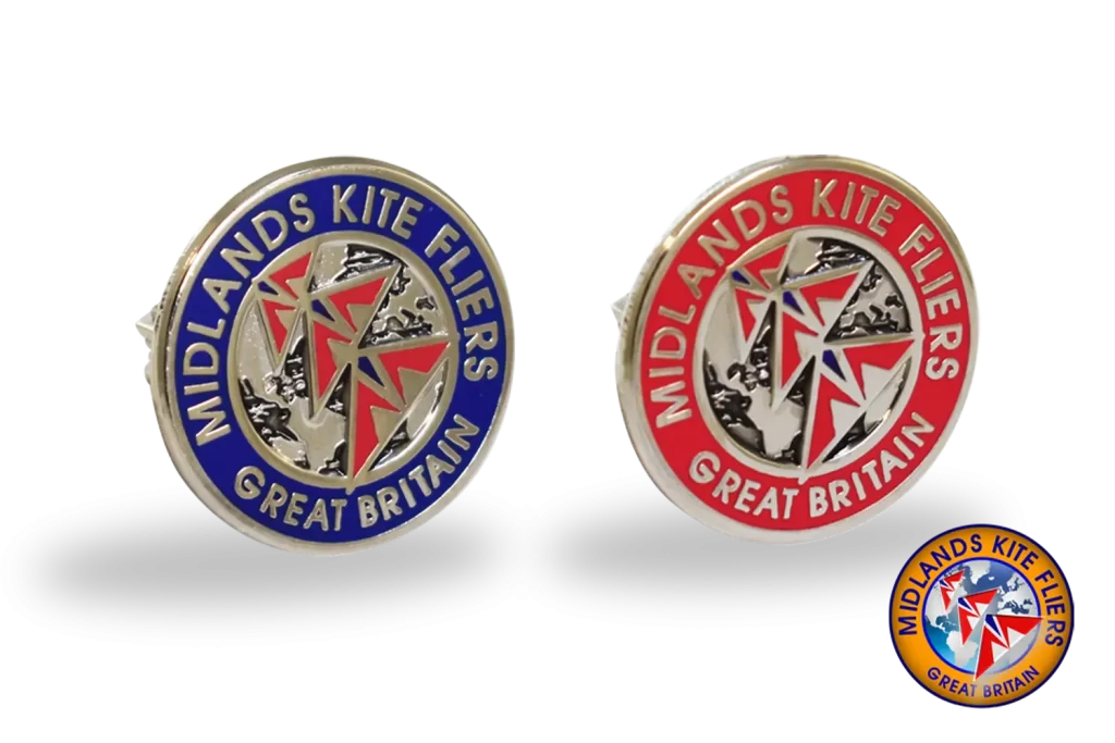 Die stamped, silver plated badges with multi tone enamel inlay.