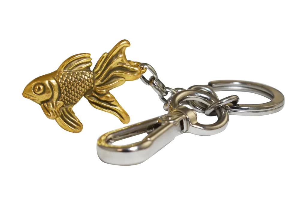 Complete die cast, gold plated goldfish keyring with contrasting silver-plated components