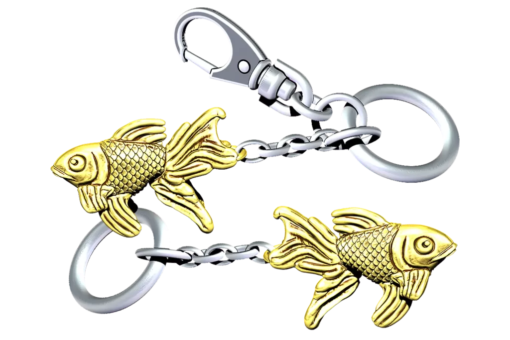 Die cast, gold plated goldfish keyring with contrasting silver plated components.