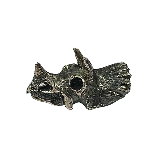 Die cast, antique silver triceratops skull badge with oxi-wipe solution.