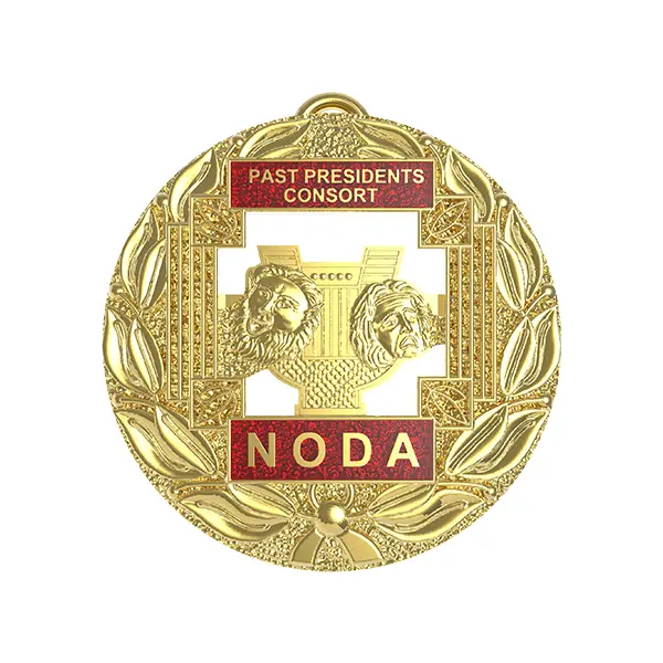 Die stamped, 9ct gold NODA badge with enamel inlay.