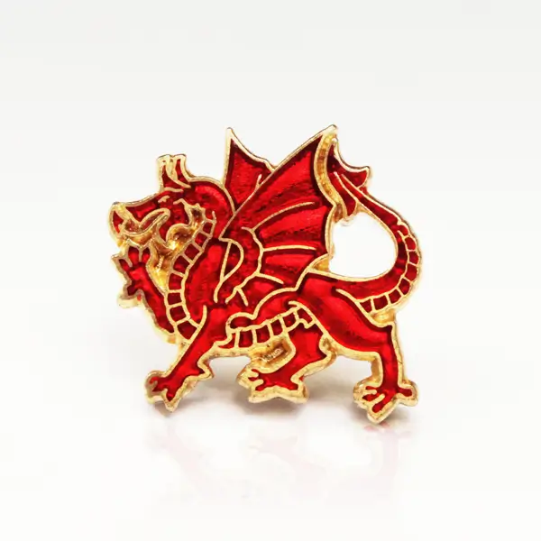 Die stamped, gold plated Welsh dragon pin badge.