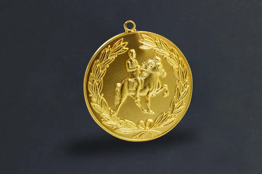 Die stamped, gold plated dressage medal