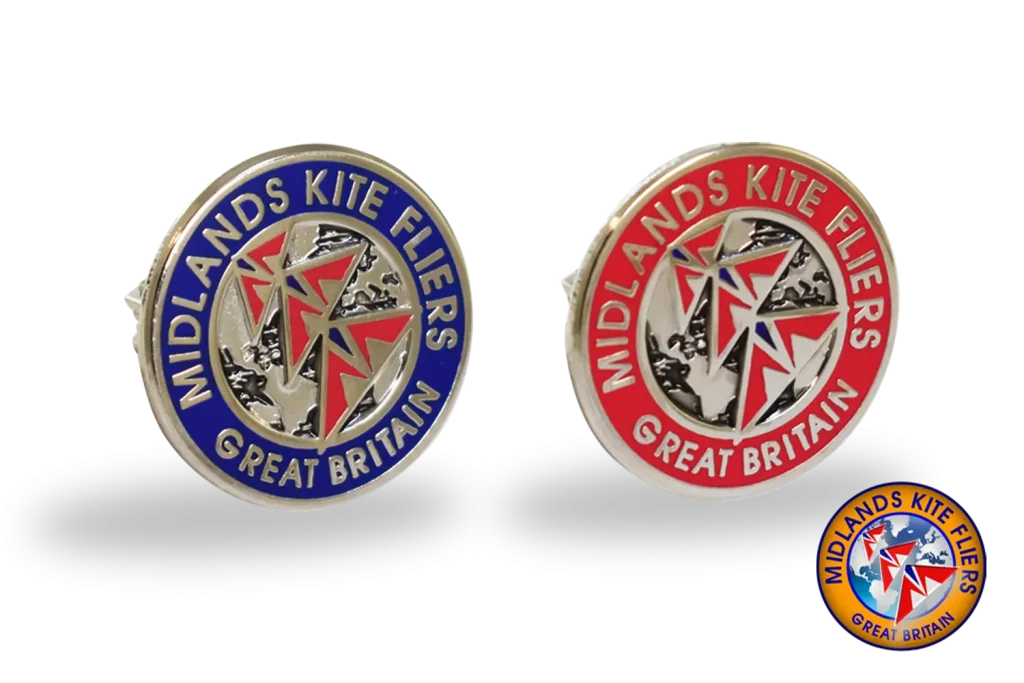 Die stamped, silver plated badges with multi tone enamel inlay.