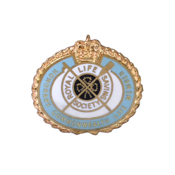 Die stamped, Gold plated badge featuring the Royal Life Saving Society crest with enamel inlay.