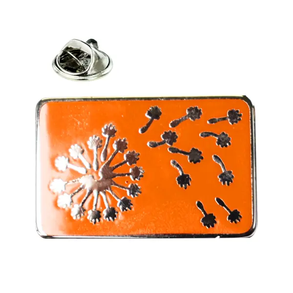 Orange dandelion pin badge