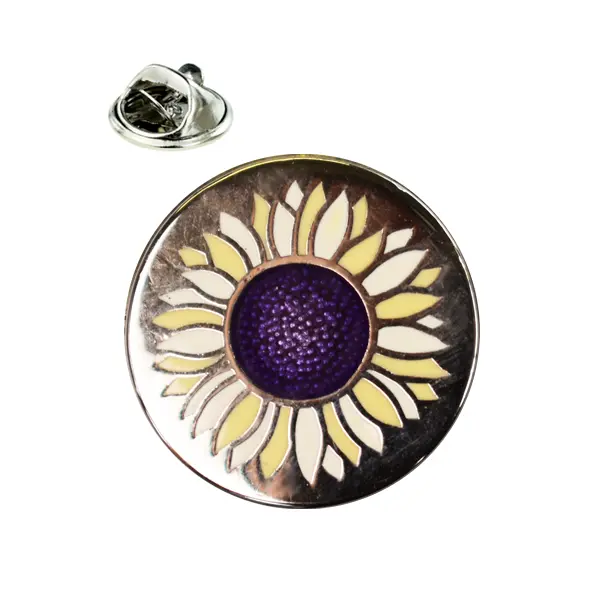 Round sunflower pin badge