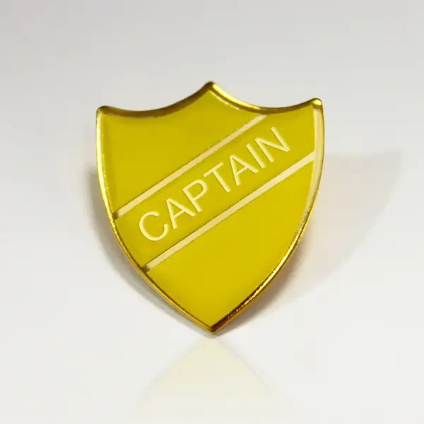 Yellow classic captain school badge