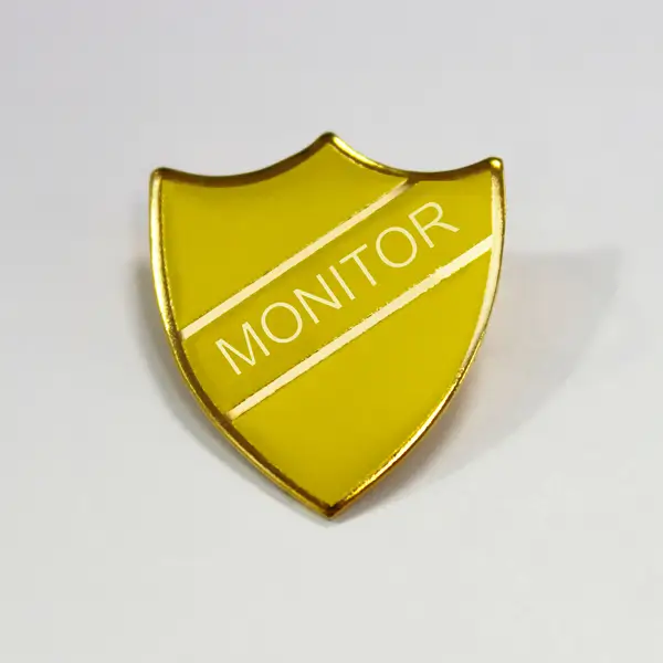 Yellow classic monitor school badge