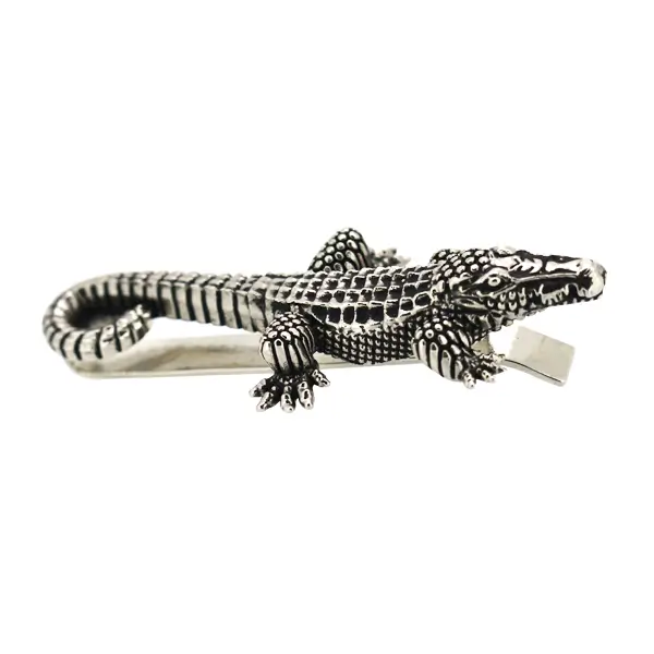 Die cast, palladium plated crocodile tie slide.