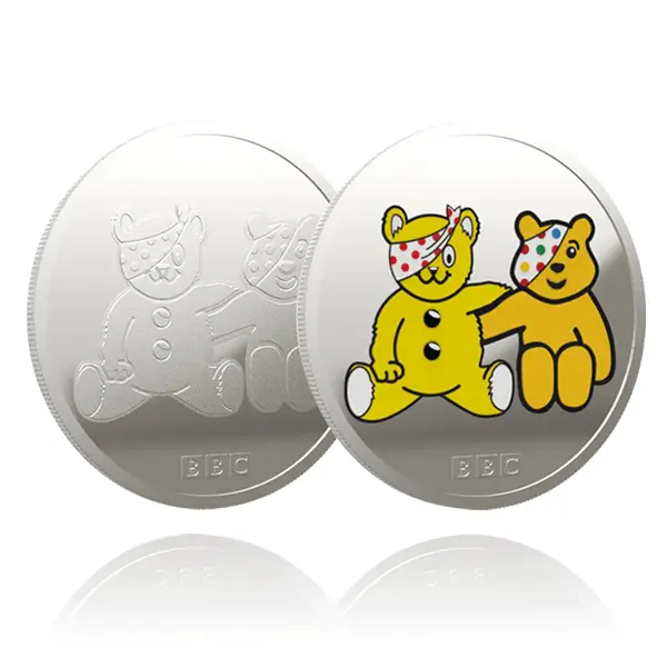 Die stamped, silver plated Children in Need branded coin render.