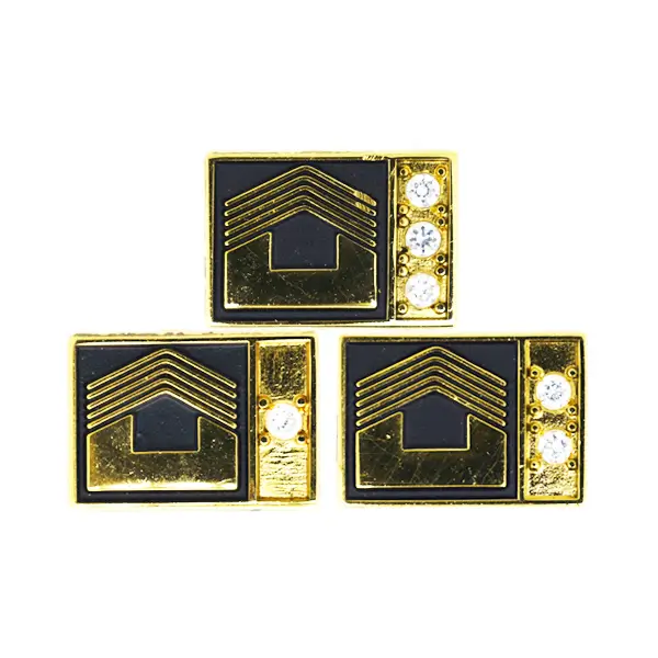 Die stamped, gold plated corporate award badges.