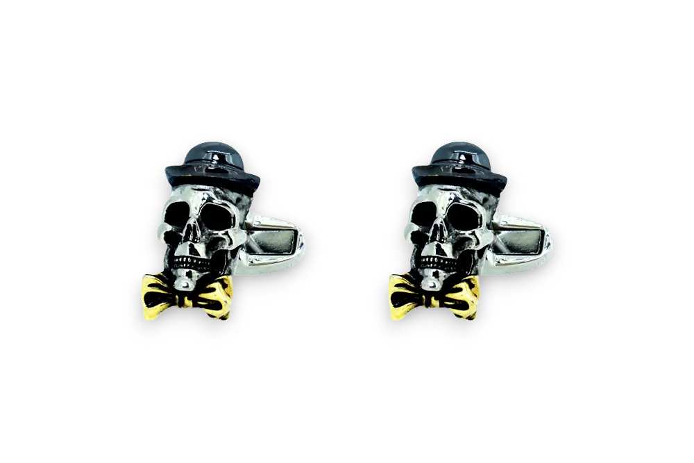 Die cast skulls with gun metal plated bowler hats and gold plated bow ties.