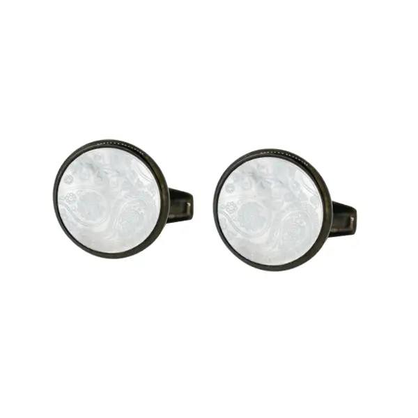 Die stamped, gun metal plated MOP cufflinks with paisley engraving pattern.