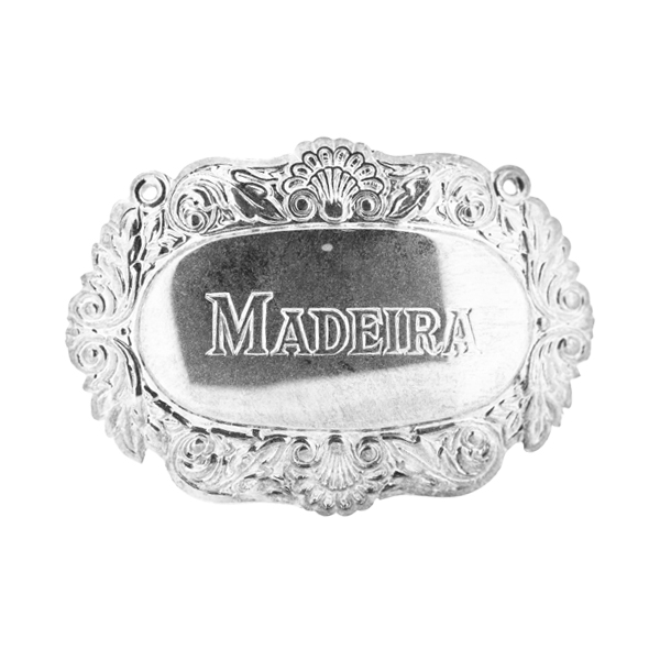 Die stamped, silver plated Madeira engraved decanter label.