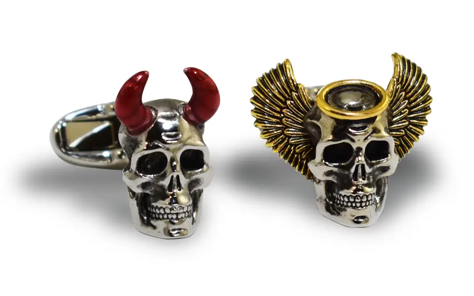 Die cast, silver and gold partial plated, angel and demon skull cufflinks.