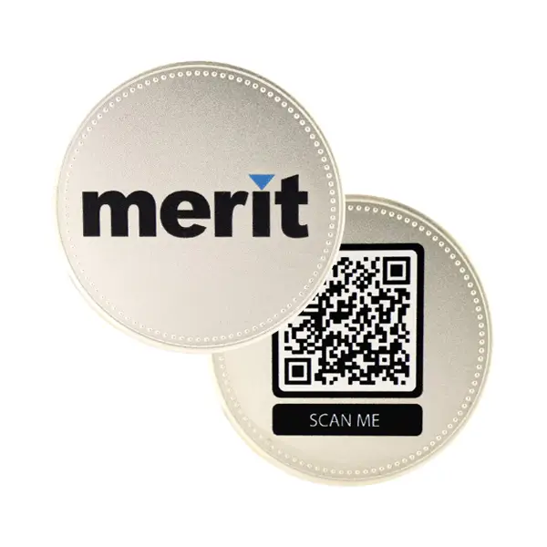Die stamped, silver plated Merit logo coin with QR code print on reverse.