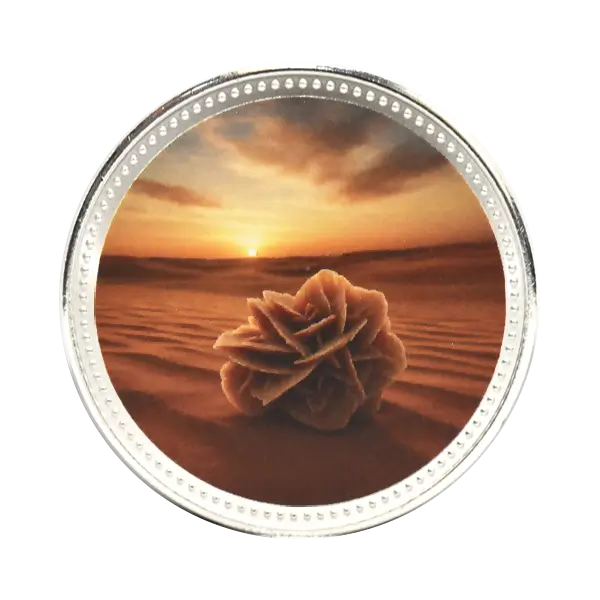 Silver collector coin with ECO UV colour print, desert rose design against a desert sunset
